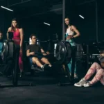 group-young-people-training-gym-indoors-maintaining-sportive-lifestyle_11zon